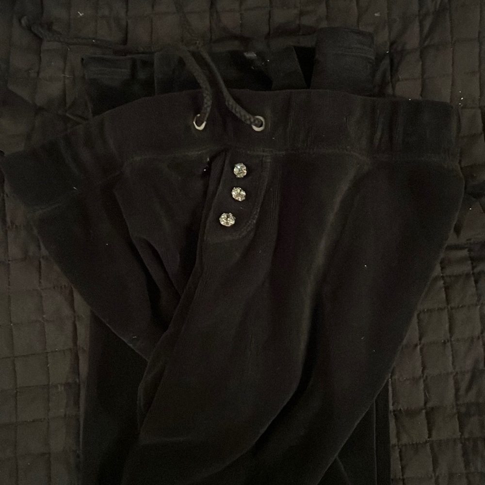 Juicy Couture full length black terry cloth pants.